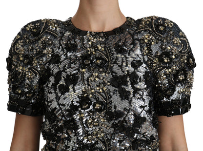 Blouse noire à paillettes et cristaux ornés