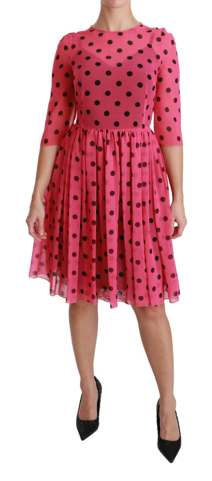 Robe trapèze rose à pois longueur genou