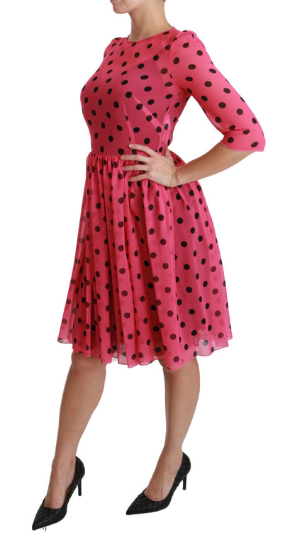 Robe trapèze rose à pois longueur genou