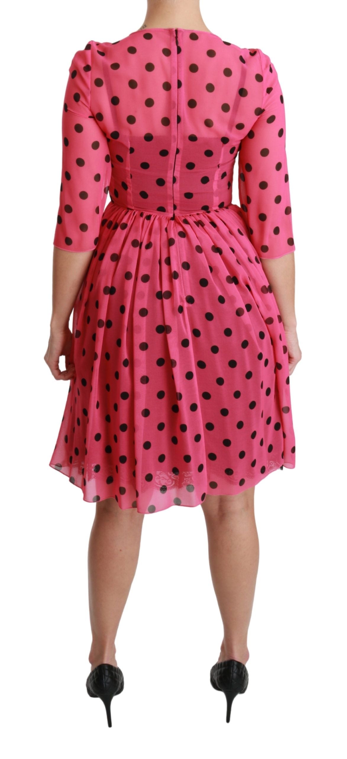 Robe trapèze rose à pois longueur genou