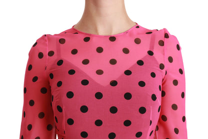 Robe trapèze rose à pois longueur genou