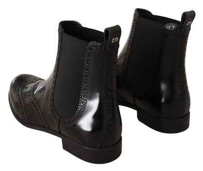 Bottines plates hautes en cuir noir