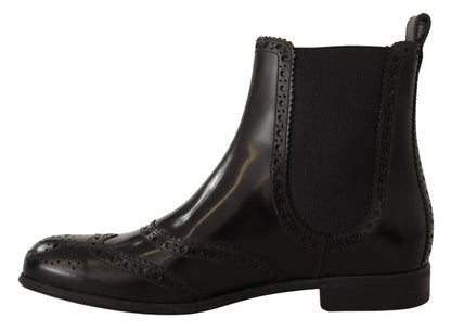 Bottines plates hautes en cuir noir