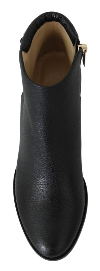 Elegante schwarze Lederstiefel mit Absatz