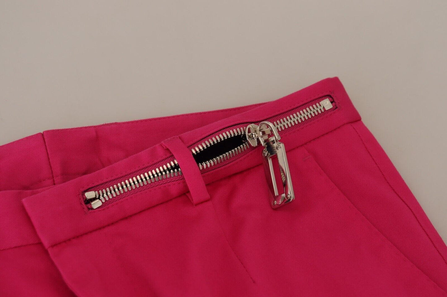 Pantaloni rosa con fibbia in vita con cerniera