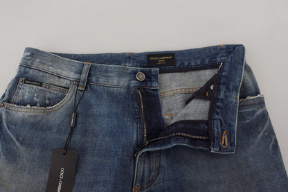 Jeans in denim dal taglio dritto e strappati in cotone blu