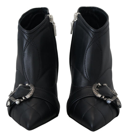 Elegante schwarze Stiefeletten aus gestepptem Leder