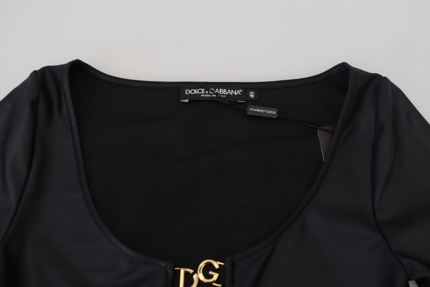 Elegant Black 3/4 Sleeve Top with Gold Detailing