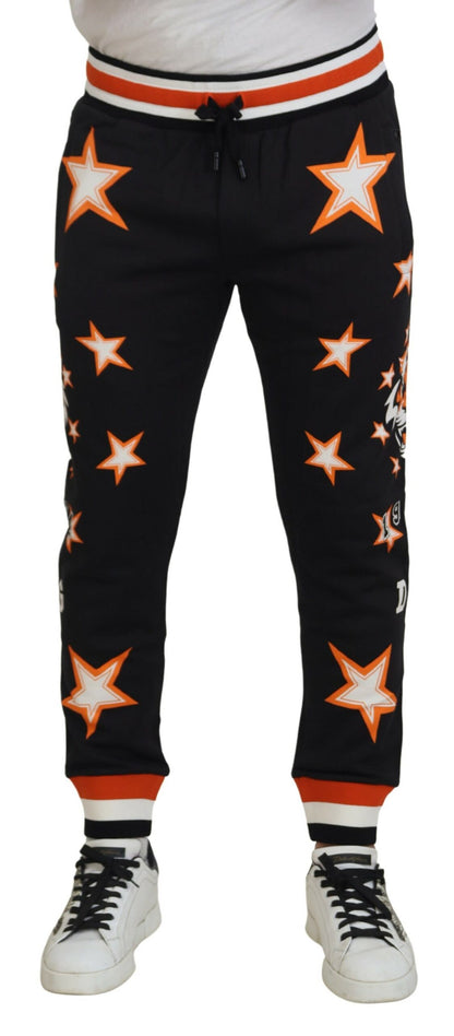 Pantaloni sportivi con stella nera arancione