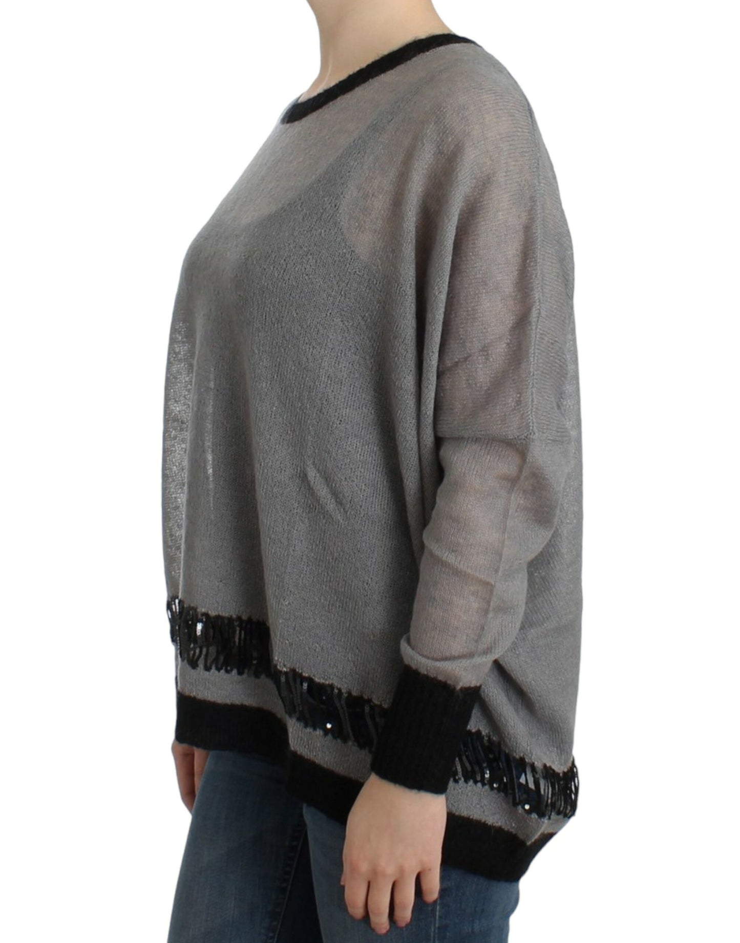 Pull asymétrique à ornements gris