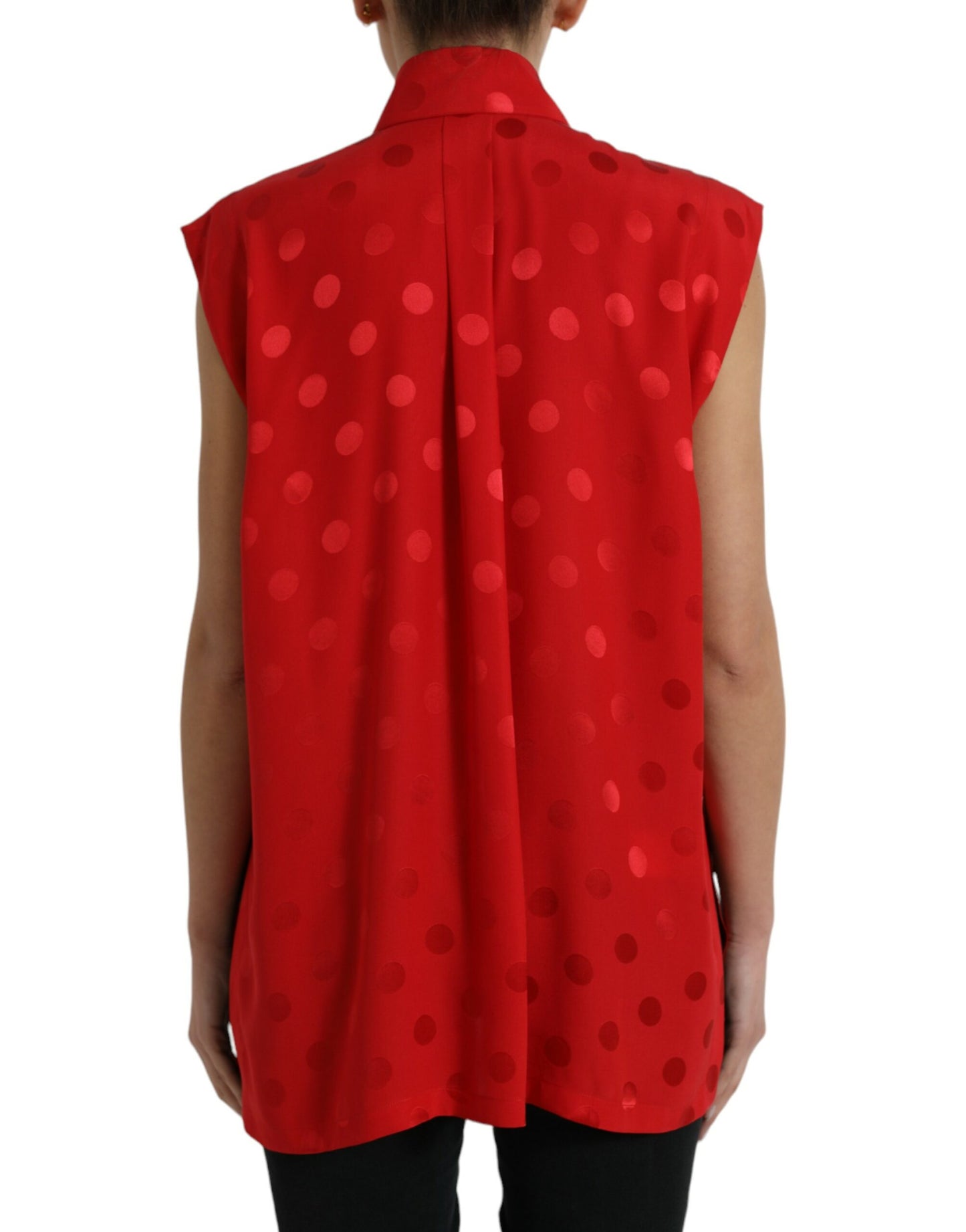 Elegante ärmellose Seidenbluse mit Polka Dots