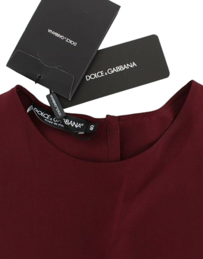 Blusa rossa in seta con maniche a 3/4