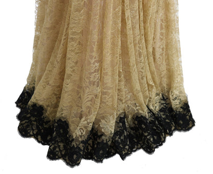 Goldschwarzes Spitzenkleid mit Blumenmuster