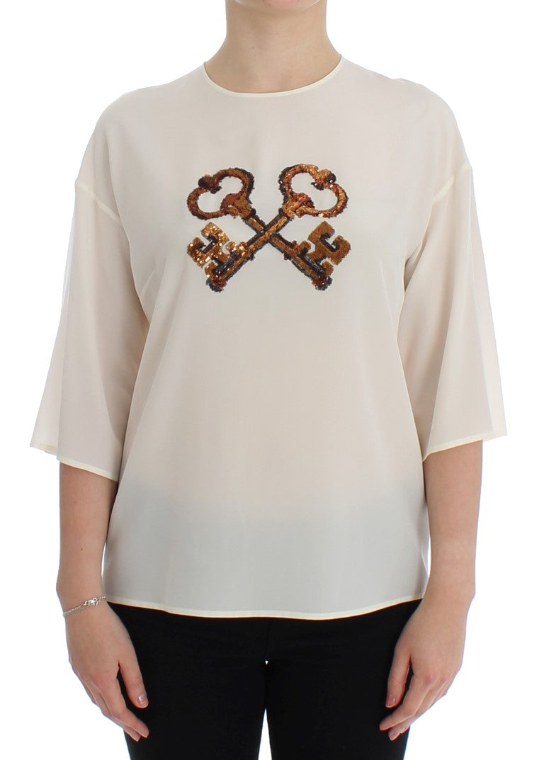 Top t-shirt in camicetta di seta con chiave bianca con paillettes