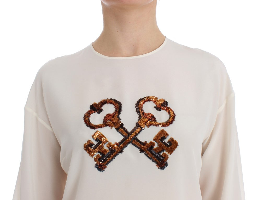 Top t-shirt in camicetta di seta con chiave bianca con paillettes